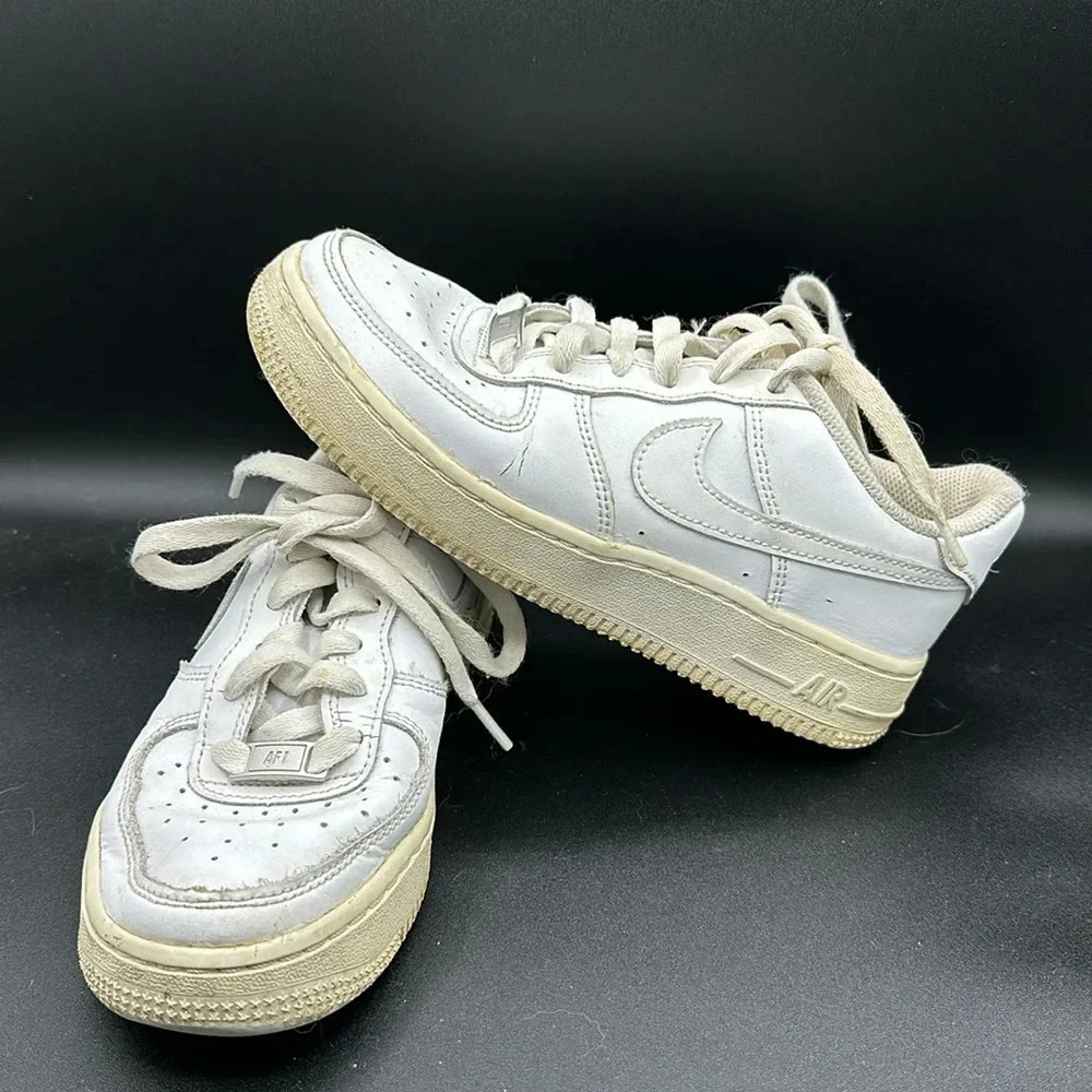 kids white Nike Air Force 1 sneakers size 3.5y